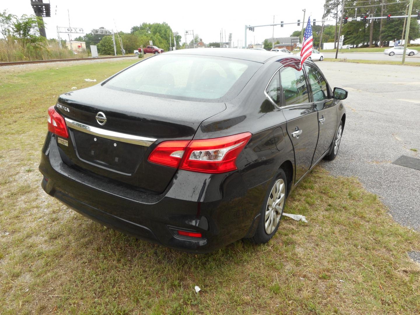 2017 Black Nissan Sentra S 6MT (3N1AB7AP8HY) with an 1.8L L4 SFI DOHC 16V engine, 6M transmission, located at 2553 Airline Blvd, Portsmouth, VA, 23701, (757) 488-8331, 36.813889, -76.357597 - ***VEHICLE TERMS*** Down Payment: $999 Weekly Payment: $100 APR: 23.9% Repayment Terms: 42 Months *** CALL ELIZABETH SMITH - DIRECTOR OF MARKETING @ 757-488-8331 TO SCHEDULE YOUR APPOINTMENT TODAY AND GET PRE-APPROVED RIGHT OVER THE PHONE*** - Photo#5